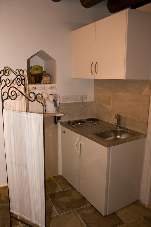 Xenios Cottages Лофу Стая снимка