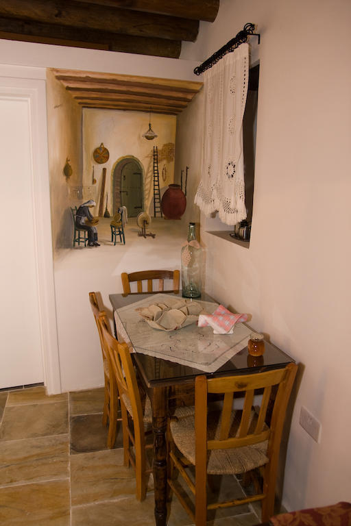 Xenios Cottages Лофу Стая снимка
